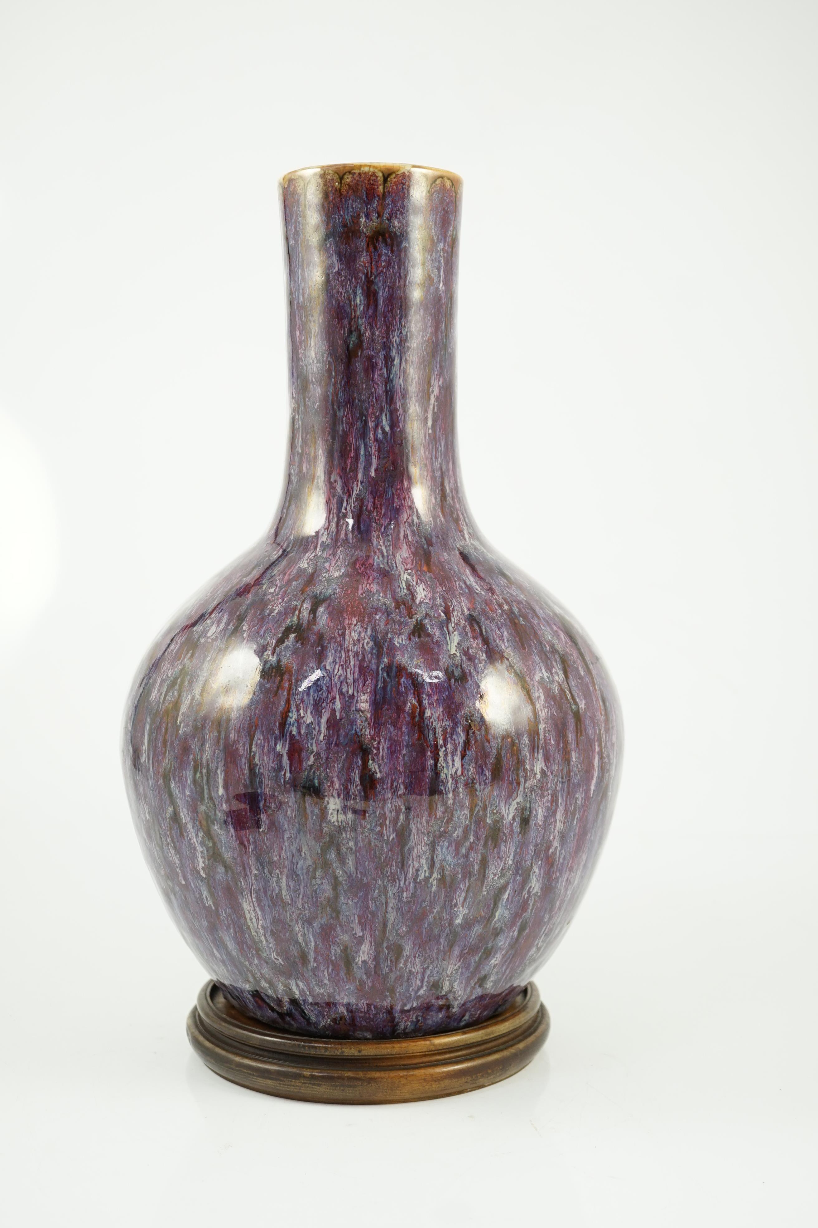 A large Chinese flambé-glazed bottle vase, tianqiuping, 18th/19th century, star crack to base